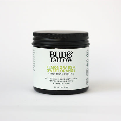 Bud & Tallow lemongrass and sweet orange product jar on a white background